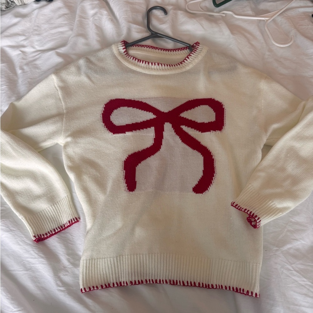 Elegant Cream Sweater with Red Bow